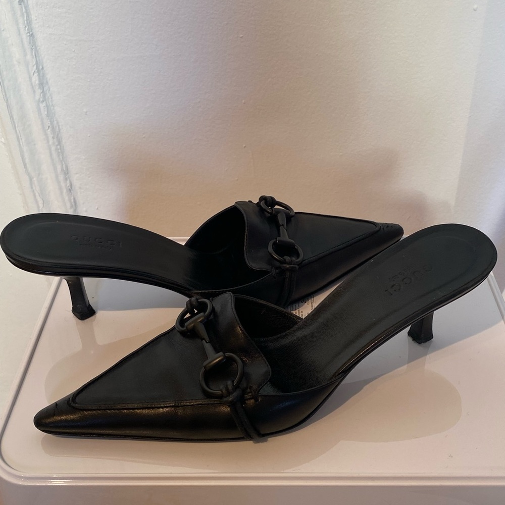 Gucci black horsebit leather mules / heels